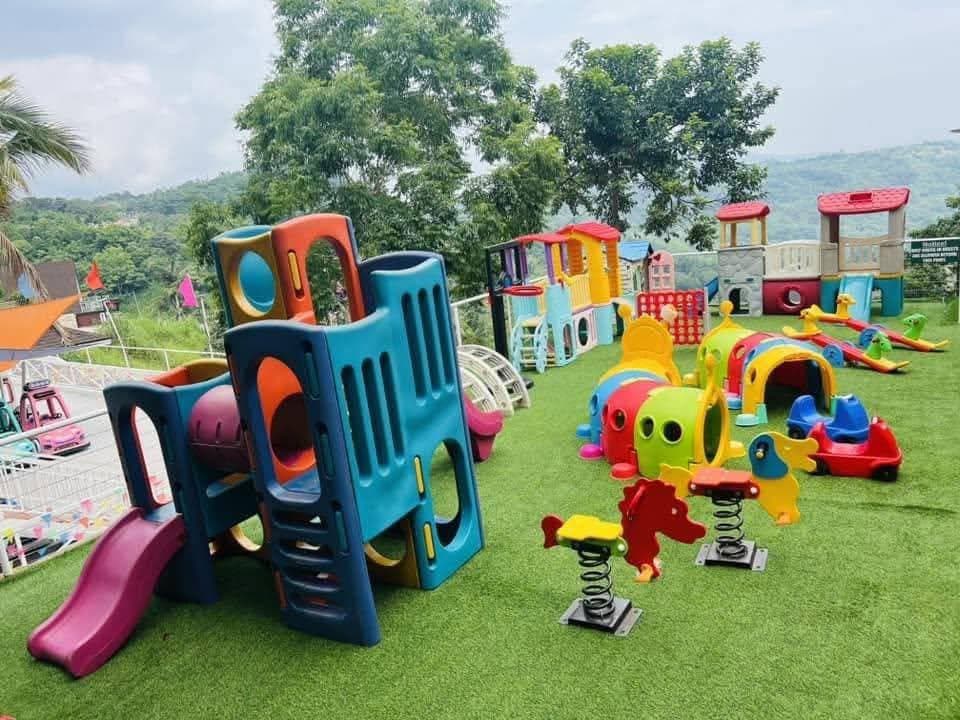 Outdoor playground and pet-friendly resort grounds